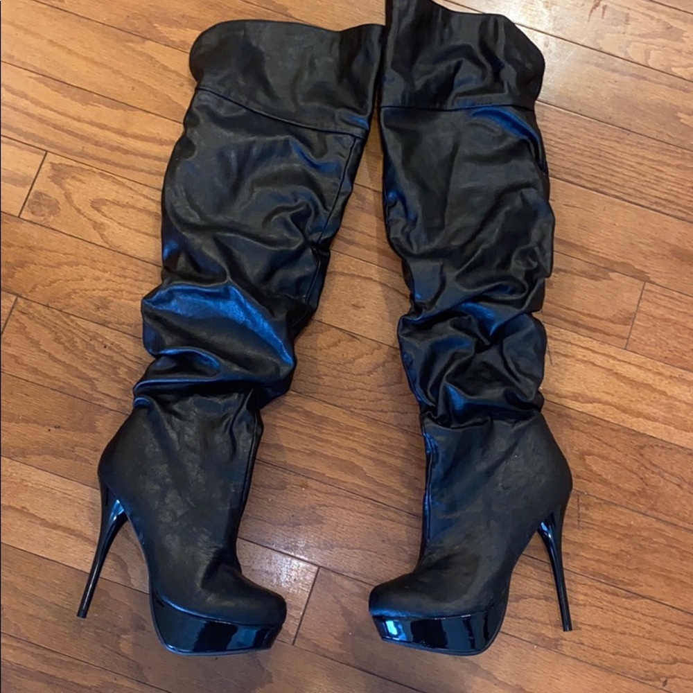 Black tall over the knee boots